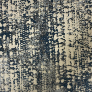 Luxury patterned carpet samples with blue and neutral woven textures at Designer's Carpet One in Mississauga, ON